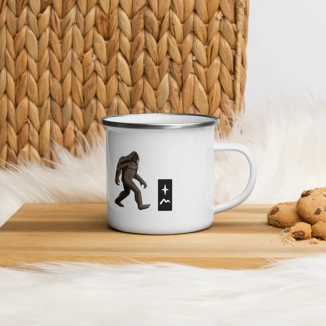 The Lift Your Eyes camp mug by the fire blanket.