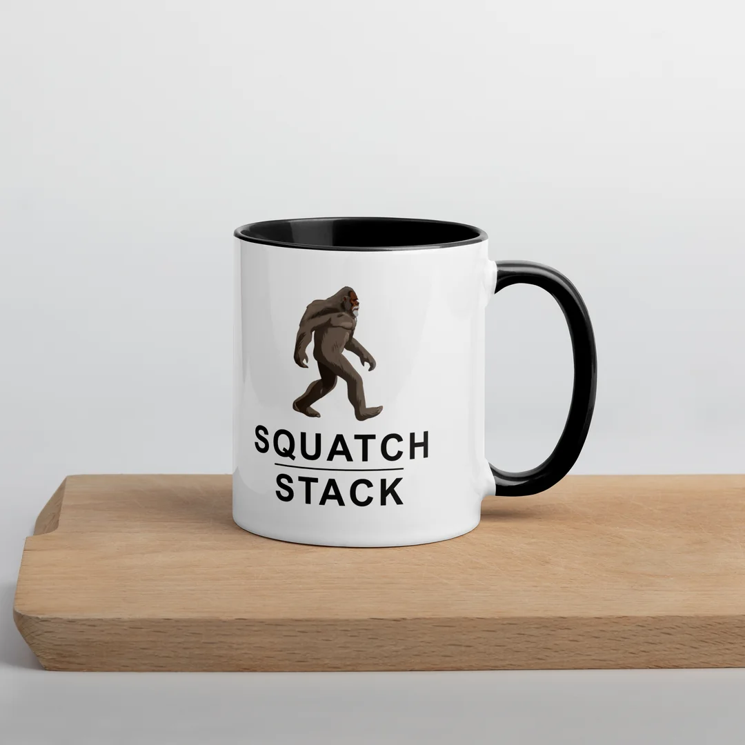The Founder mug on a wooden board.