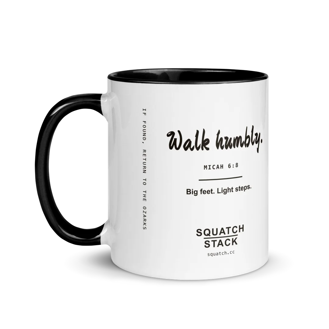 The Walk Humbly mug, handle on the left.
